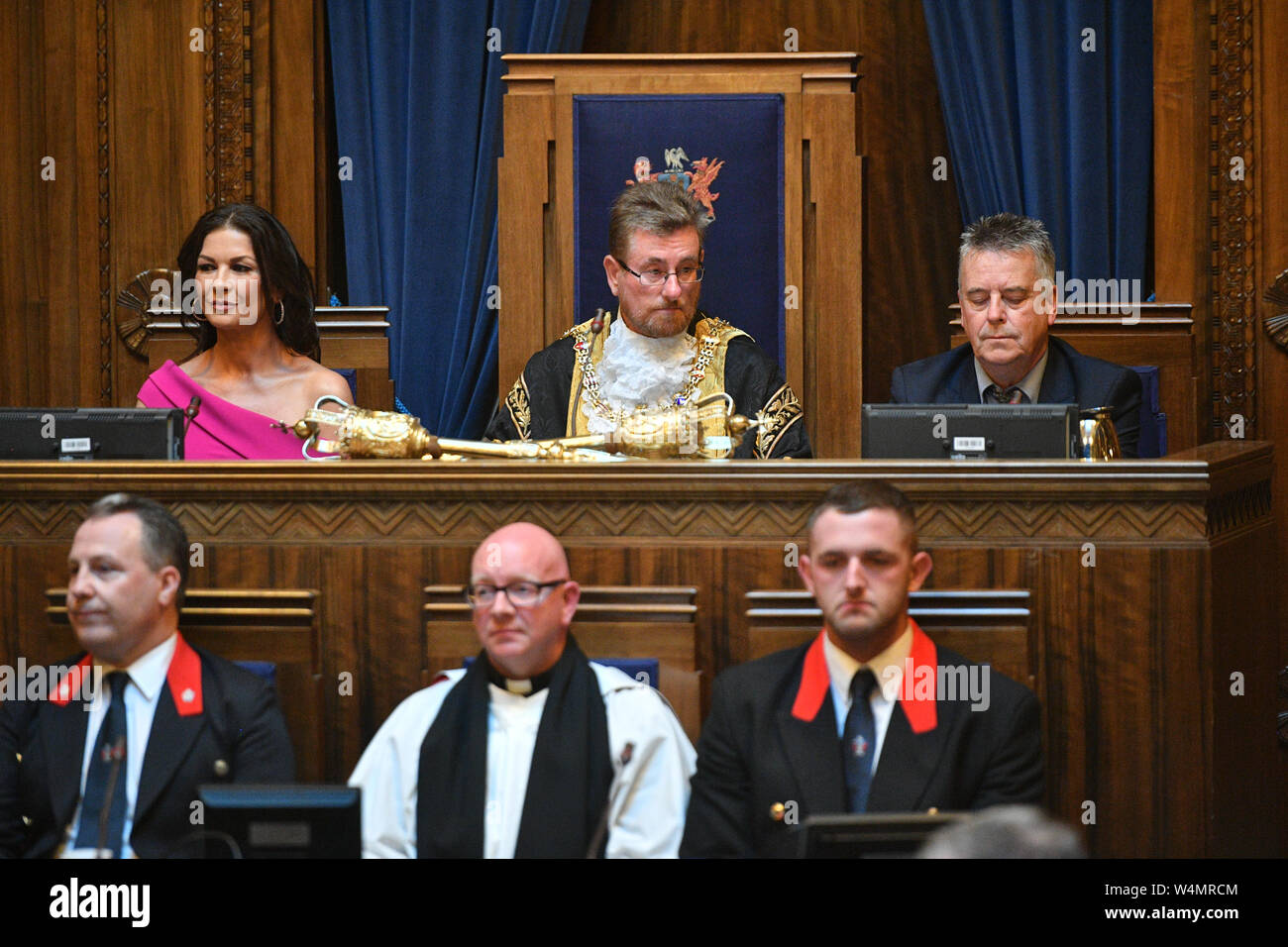 Catherine Zeta-Jones (back left) during a ceremony at the Guildhall, Swansea, where she is receiving the Honorary Freedom of the City and County of Swansea. Stock Photo