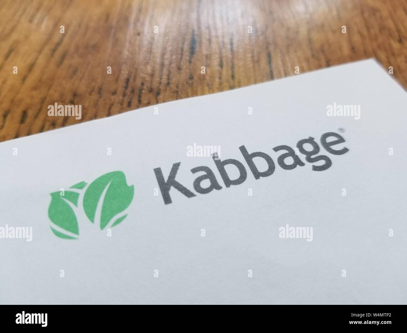 Close-up of logo for finance company Kabbage on paper on a light wooden surface, June 13, 2019. () Stock Photo