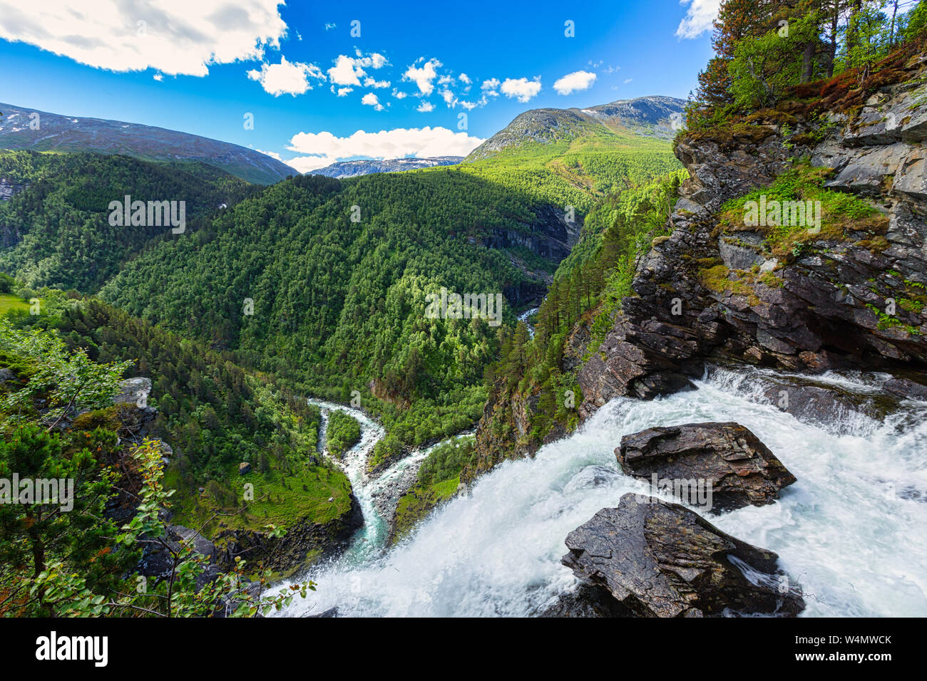 A wild and impressive Norwegian landscape with mountains, rivers, forests in summer - a popular vacation destination - Norway Stock Photo