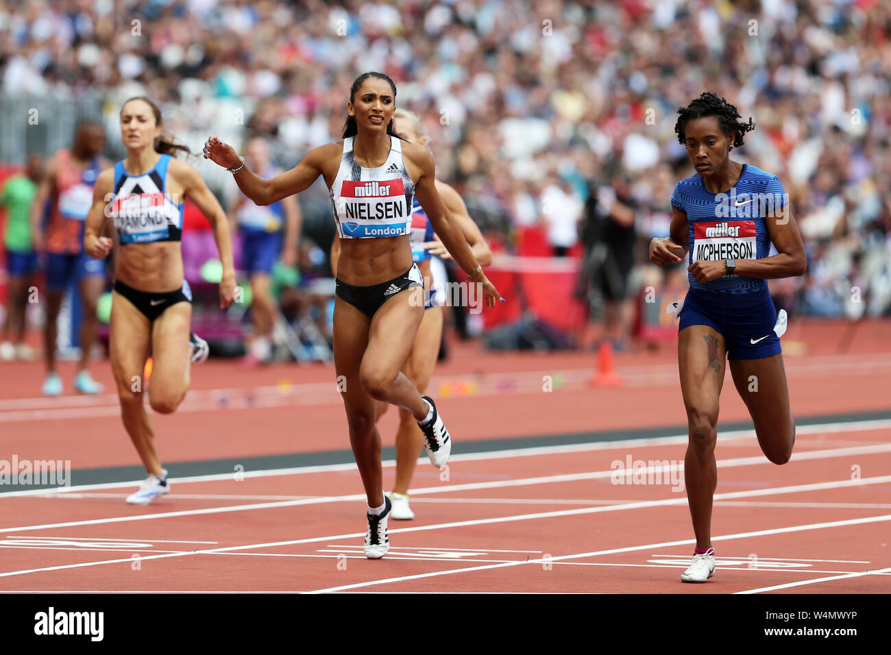 Laviai NIELSEN (Great Britain) and Stephenie Ann MCPHERSON (Jamaica), crossing the finish line in the Women's 400m Final at the 2019, IAAF Diamond League, Anniversary Games, Queen Elizabeth Olympic Park, Stratford, London, UK. Stock Photo