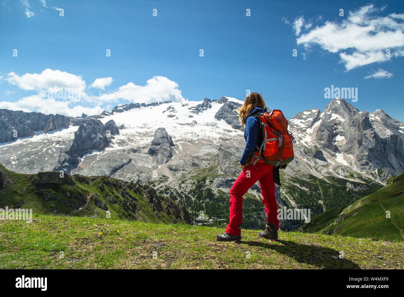 Hiking woman in the Alps, Dolomites, Italy Stock Photo - Alamy