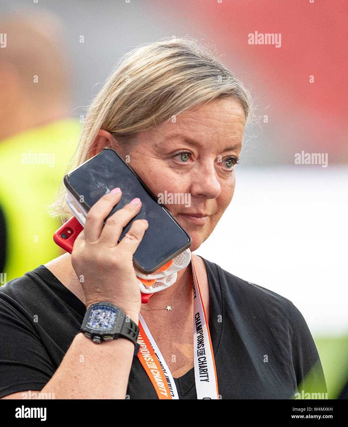 Leverkusen Deutschland. 21st July 2019. Sabine KEHM Manager of Mick Schumacher with phone iphone mobile champions for charity charity football game in honor of Michael Schumacher Team Nowitzki All Sta...