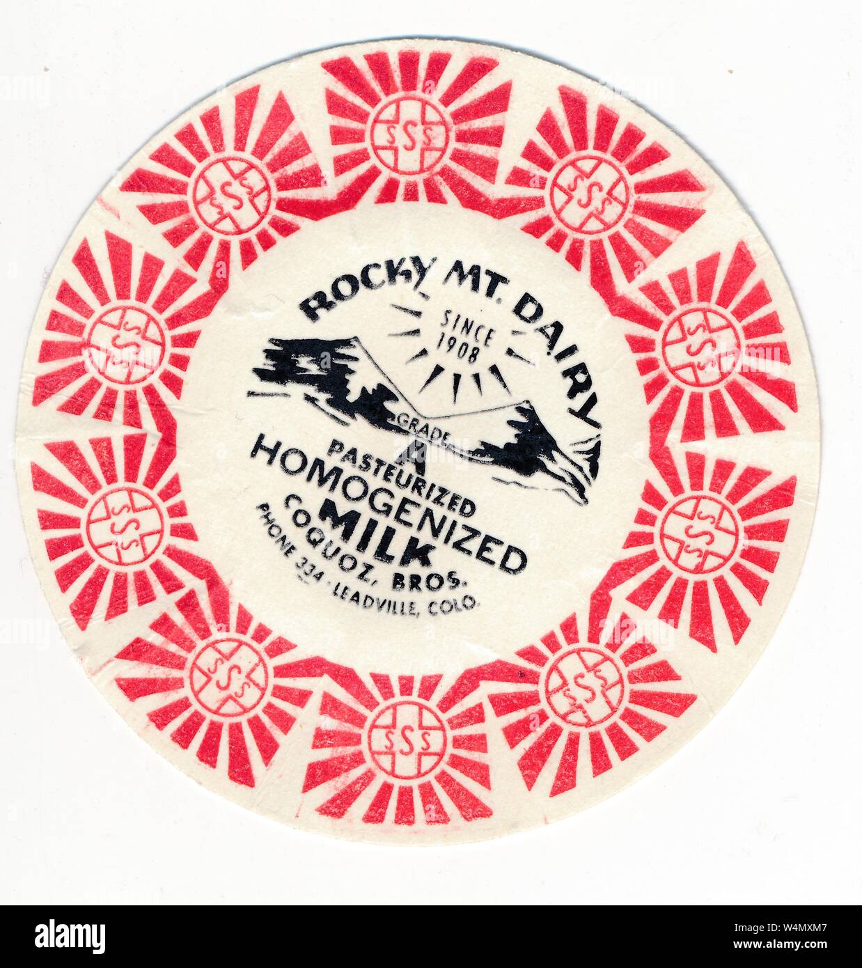 A Rocky Mountain Dairy brand milk bottle cap, with a mountain range