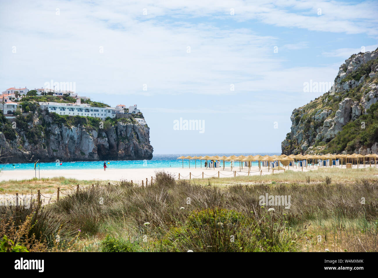 Sunny day at the beach at Cala en Porter, Menorca Stock Photo