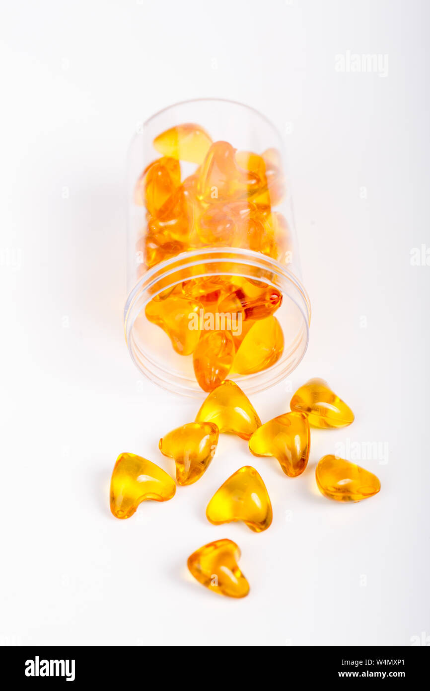 cod liver oil heart shape on white background Stock Photo Alamy