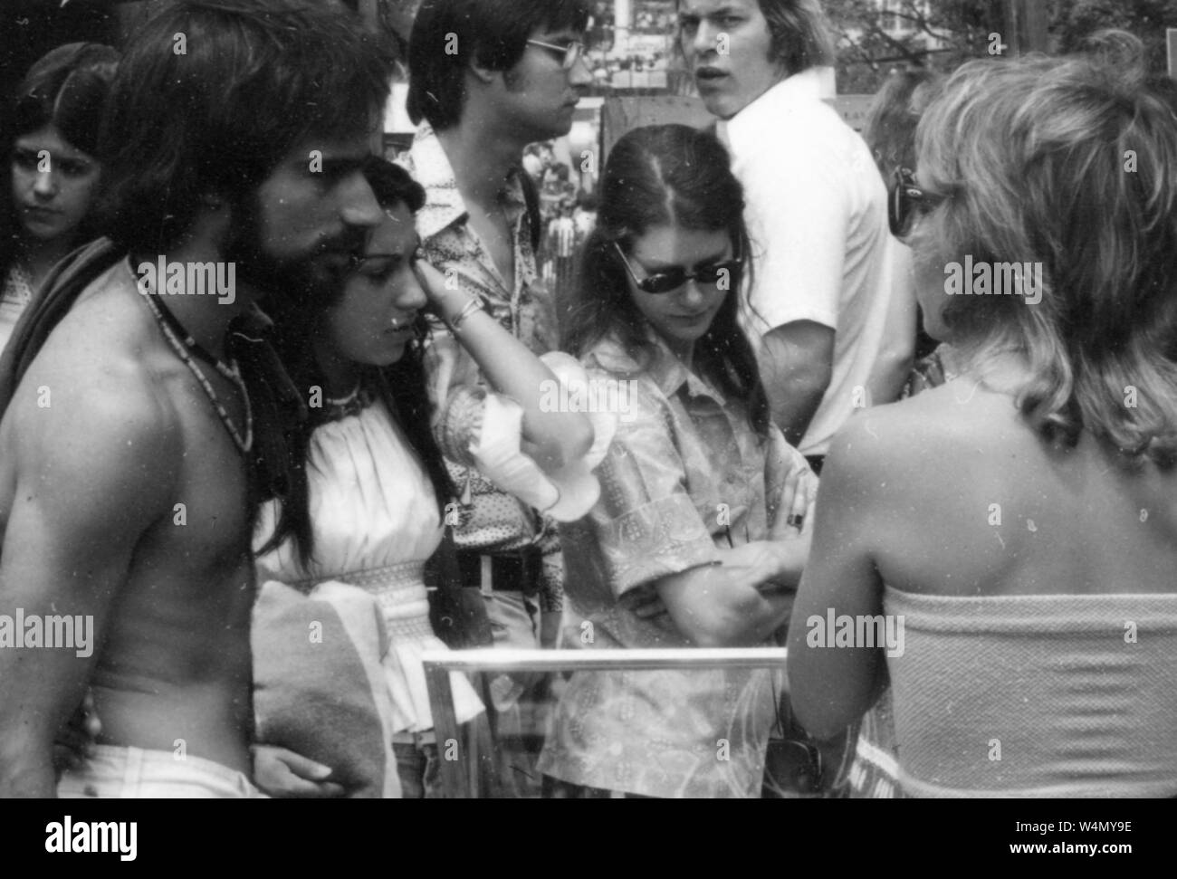 College students and other members of the Johns Hopkins and Baltimore communities are gathered on the Homewood campus for the annual Spring Fair, which included outdoor concerts, plays, rides, vendors, and more, April, 1976. From the Historical Photographs Collection, Baltimore, Maryland. () Stock Photo