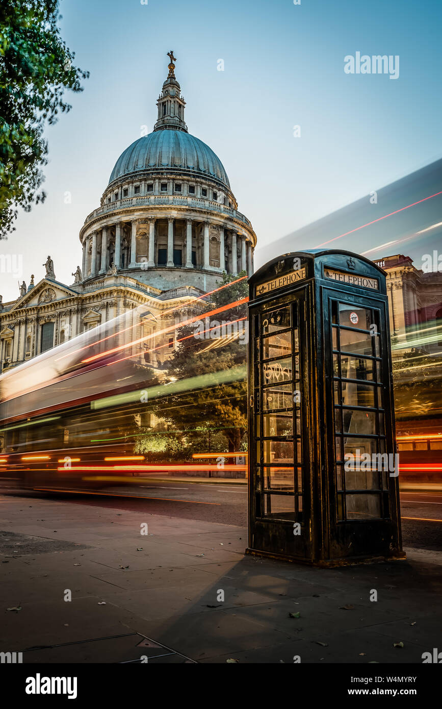 St Paul's Cathedral, Black Telephone Box, and Light Trails, London, UK Stock Photo