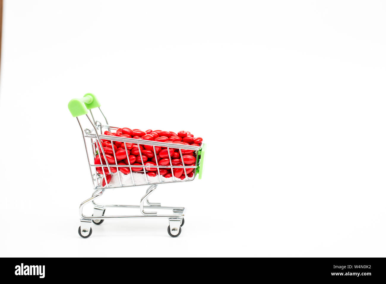 Cart Capsule drug capsule on mini cart Stock Photo - Alamy