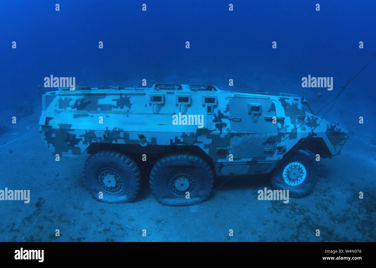 (190724) -- AMMAN, July 24, 2019 (Xinhua) -- Handout photo obtained on July 23, 2019 shows a Jordanian Armed Forces armoured vehicle lying on the seabed of the Red Sea as part of a new underwater military museum off the coast of the southern port city of Aqaba, Jordan. The museum is built by Aqaba Special Economic Zone to attract more tourists in summer, (Aqaba Special Economic Zone/Handout via Xinhua) Stock Photo