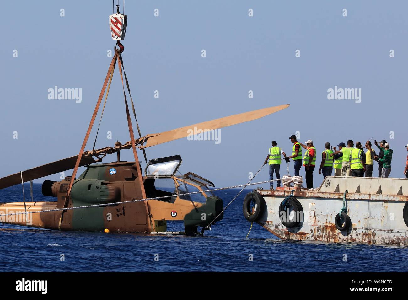 (190724) -- AMMAN, July 24, 2019 (Xinhua) -- A body of a military helicopter donated by the Jordanian Royal Air Force, is submerged in the Red Sea off Aqaba, as part of a new underwater military museum, in south Jordan, July 24, 2019. The museum is built by Aqaba Special Economic Zone to attract more tourists in summer, (Photo by Mohammad Abu Ghosh/Xinhua) Stock Photo