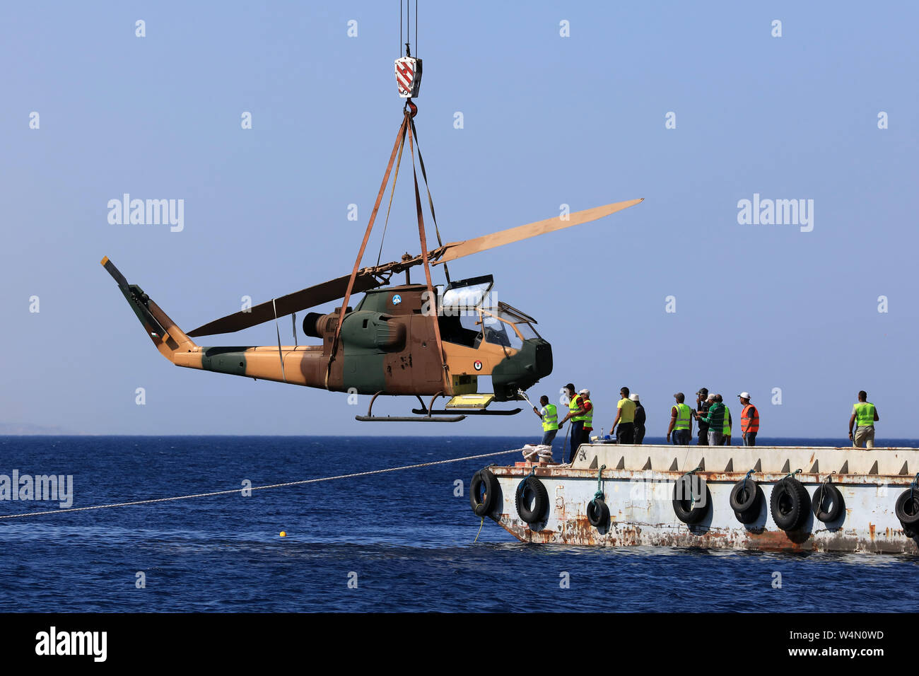 (190724) -- AMMAN, July 24, 2019 (Xinhua) -- A body of a military helicopter, donated by the Jordanian Royal Air Force, is submerged in the Red Sea off Aqaba, as part of a new underwater military museum, in south Jordan, July 24, 2019. The museum is built by Aqaba Special Economic Zone to attract more tourists in summer, (Photo by Mohammad Abu Ghosh/Xinhua) Stock Photo