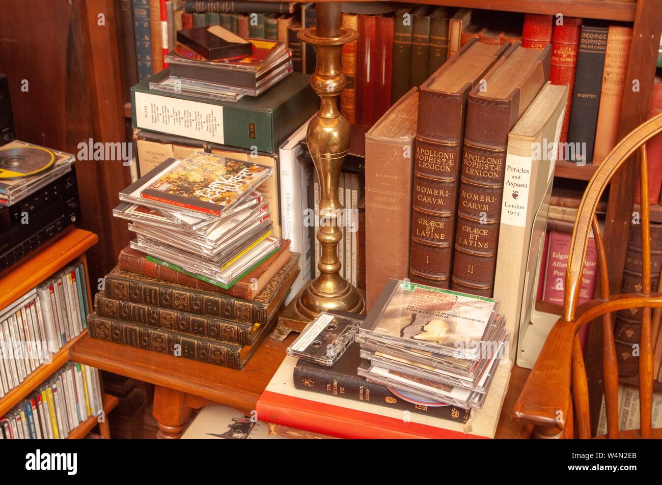 Close-up of books and compact discs in humanities professor Richard A Macksey's home library, which he bequeathed to the Johns Hopkins University, Baltimore, Maryland, December 14, 2006. From the Homewood Photography Collection. () Stock Photo
