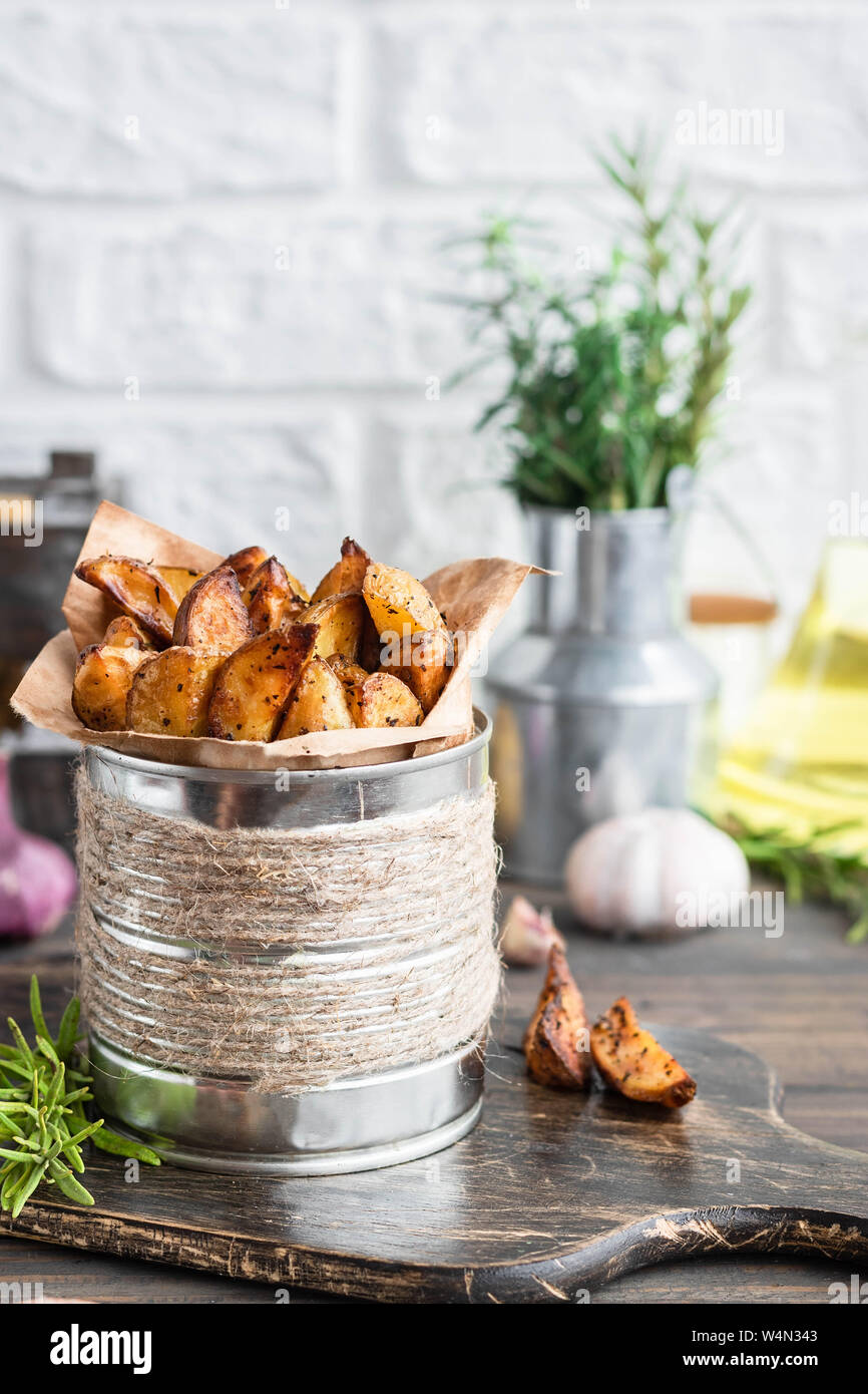 Baked young potatoes in a rustic style with rosemary, garlic and sumac ...