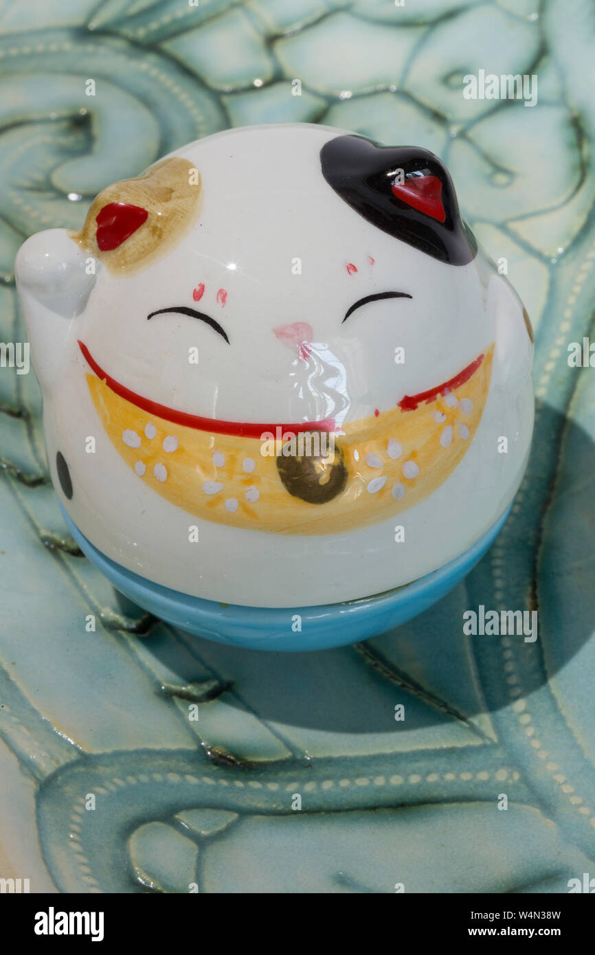 Maneki Neko, Lucky Cat Figurine Stock Photo