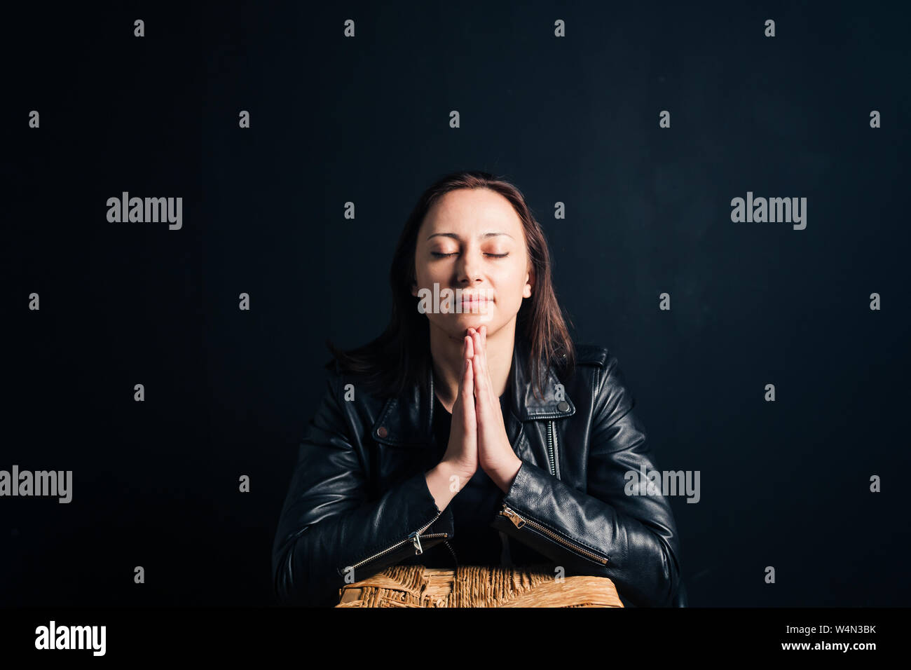 Woman in black leather jacket hi-res stock photography and images - Alamy