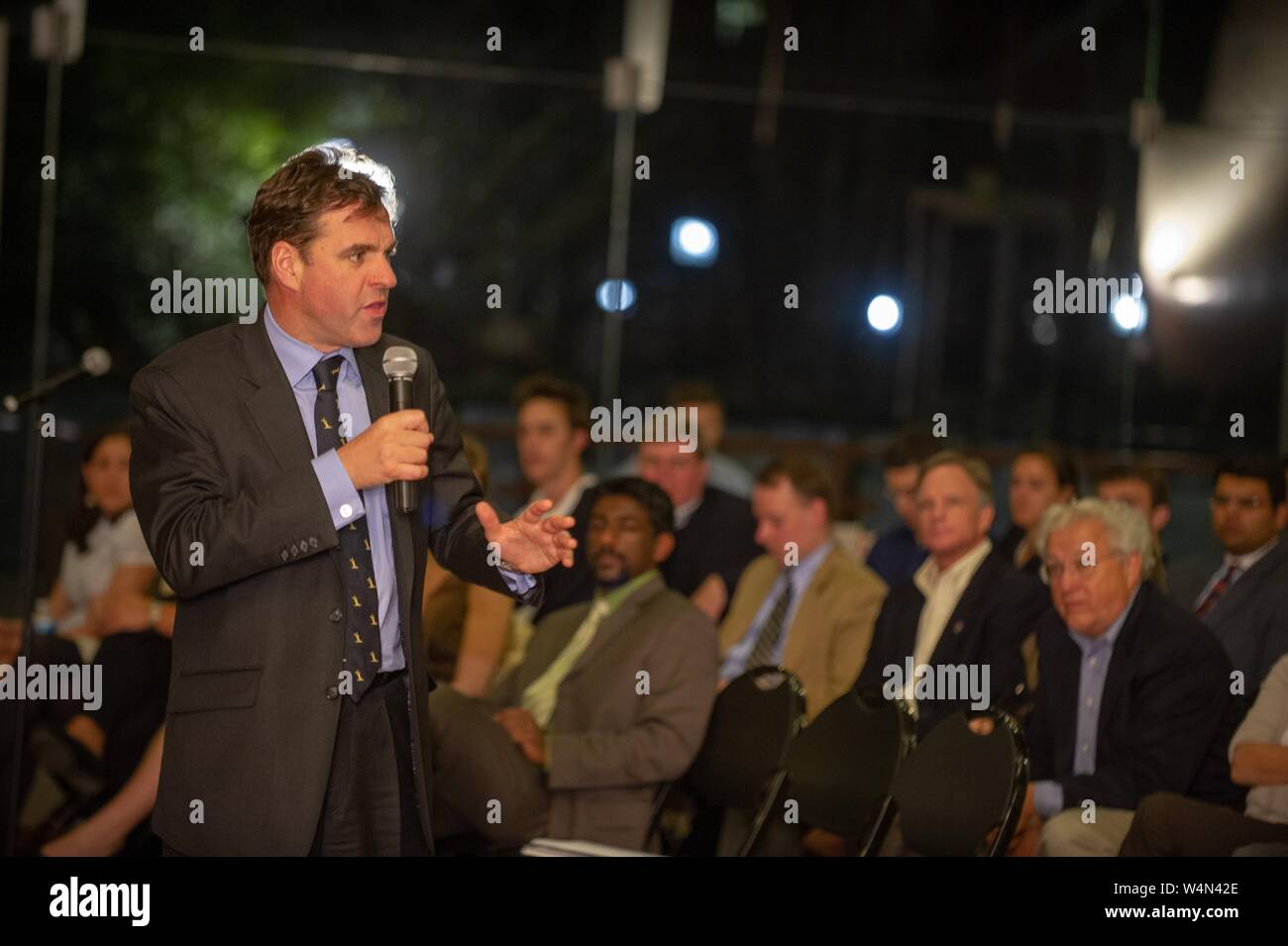 Three-quarter profile view of Niall Ferguson, Scottish economic historian, speaking at a Foreign Affairs Symposium at the Johns Hopkins University, Baltimore, Maryland, March 24, 2010. From the Homewood Photography Collection. () Stock Photo