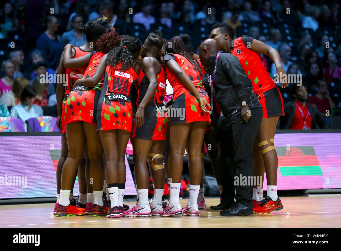 Malawi team group in a huddle during the Netball World Cup match at the