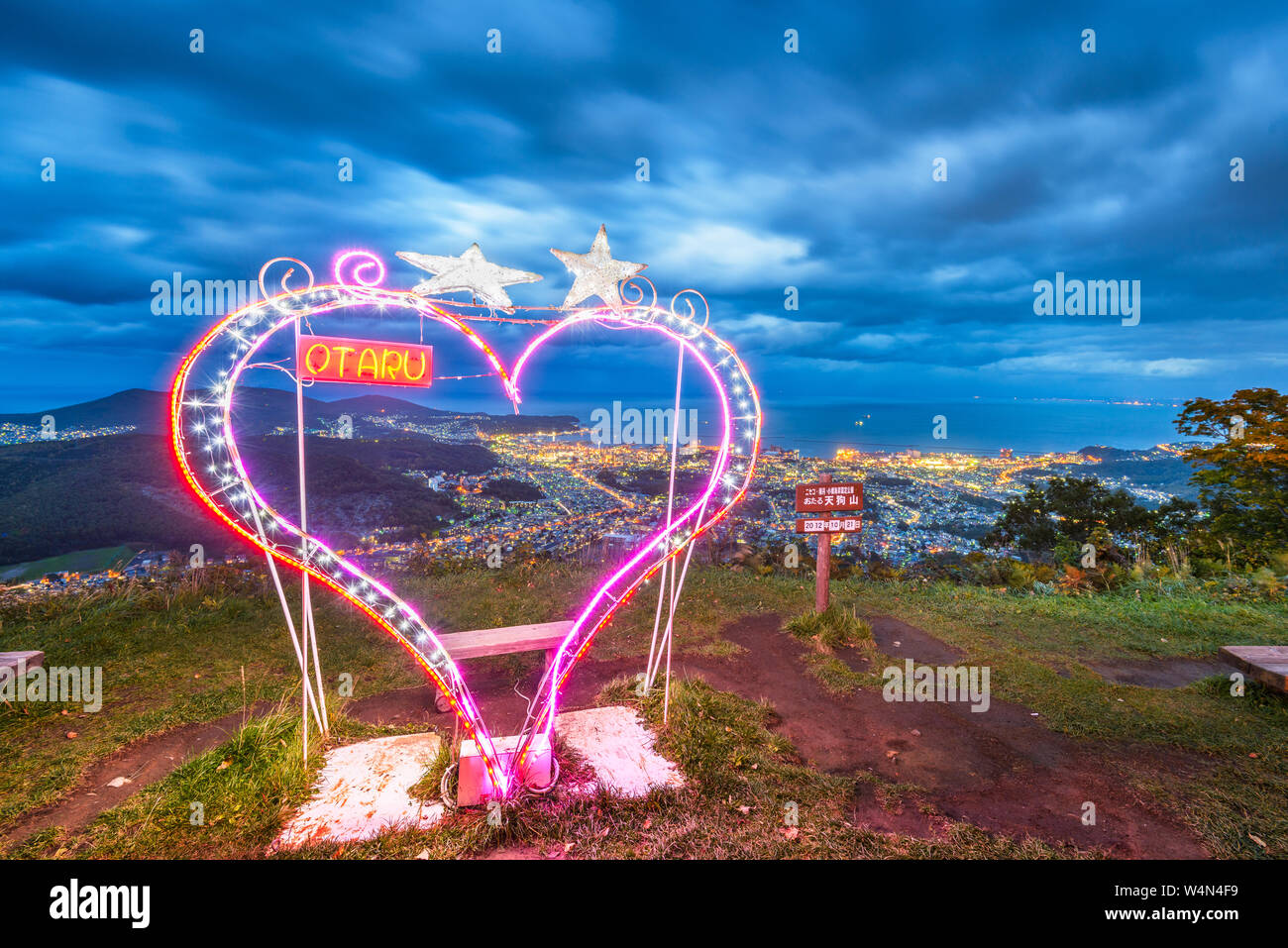 OTARU, JAPAN - OCTOBER 21, 2012: Heartshaped photo spot on Mt. Tengu at twilight. The mountain is reknown for the ropeway and view. Stock Photo