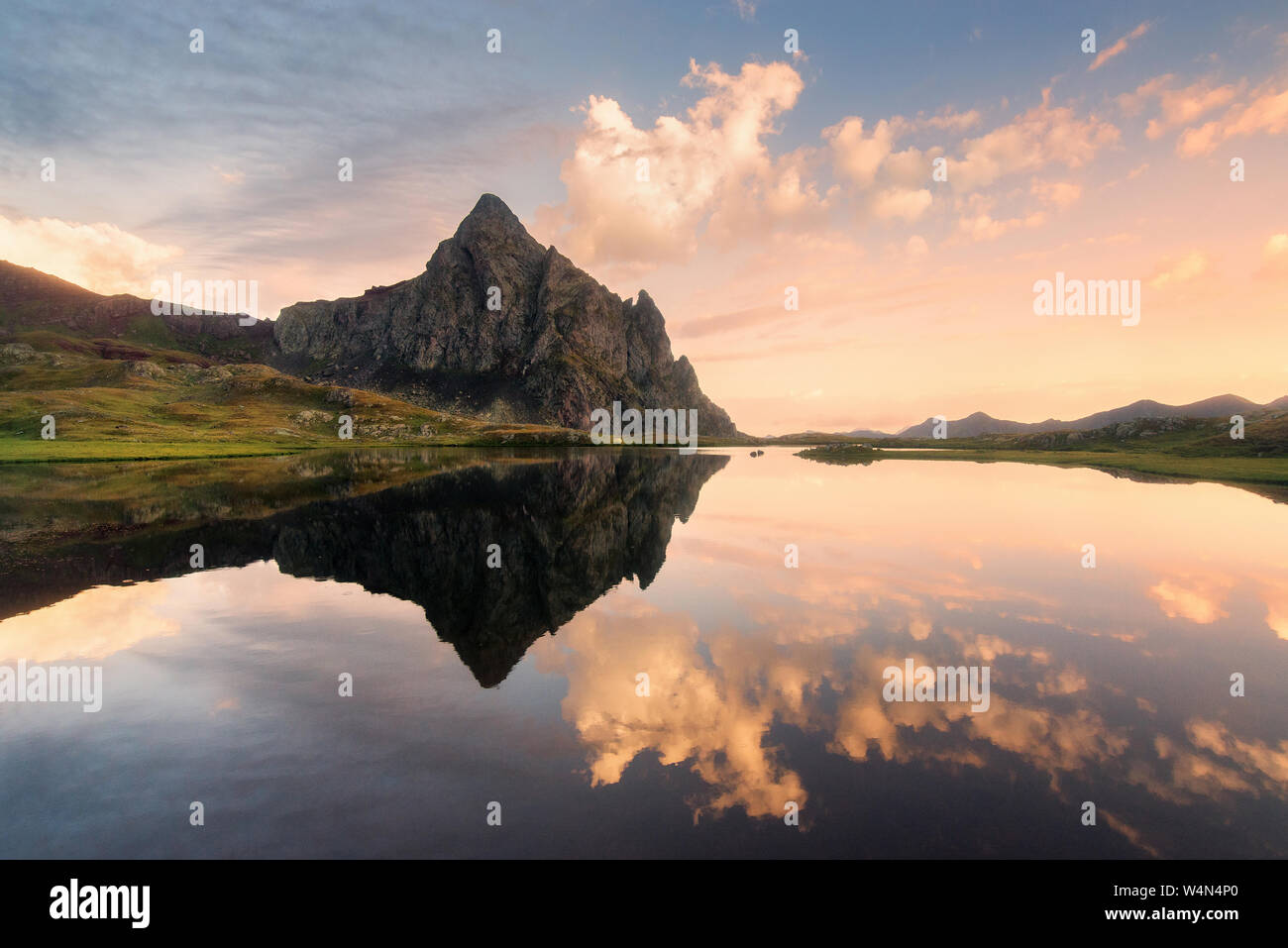 Anayet mountain reflected in Anayet lake at sunrise, Formigal, Huesca, spanish pyrenees Stock Photo