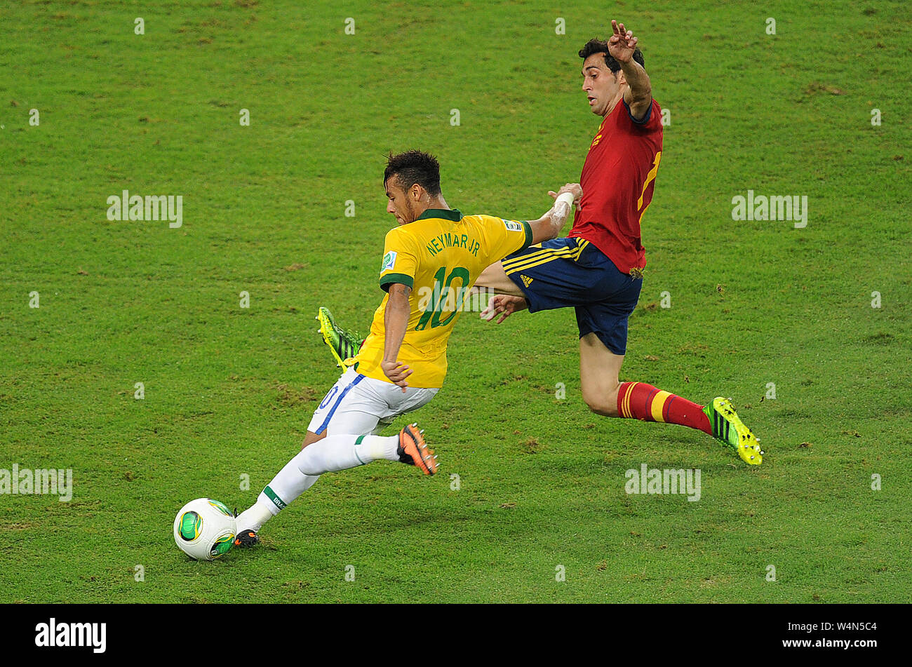 The Brazilian soccer player Neymar, playing the ball in the game Brazil Vs. Spain in the final of the Confederations Cup 2013, at the Maracana Stadium Stock Photo