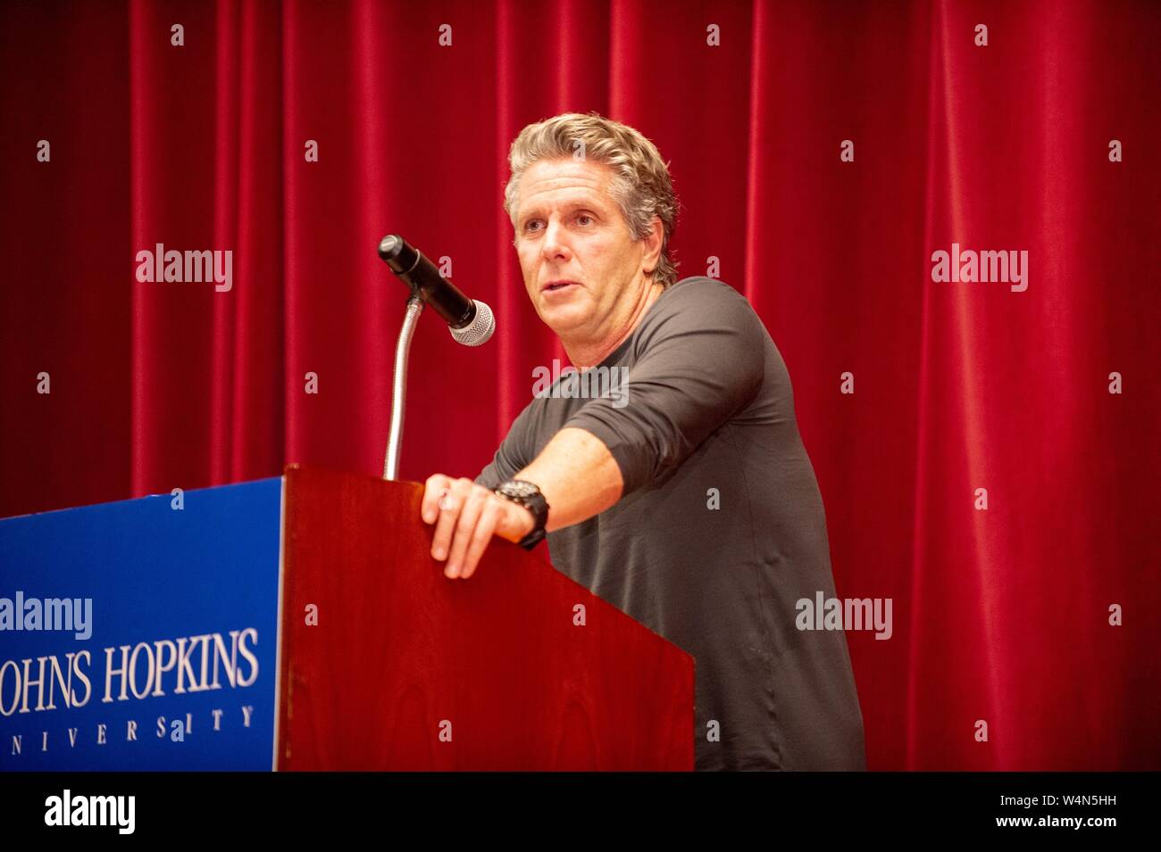 Medium shot of Donny Deutsch, marketing professional and television personality, speaking at a Milton S Eisenhower Symposium at the Johns Hopkins University, Baltimore, Maryland, November 9, 2010. From the Homewood Photography Collection. () Stock Photo
