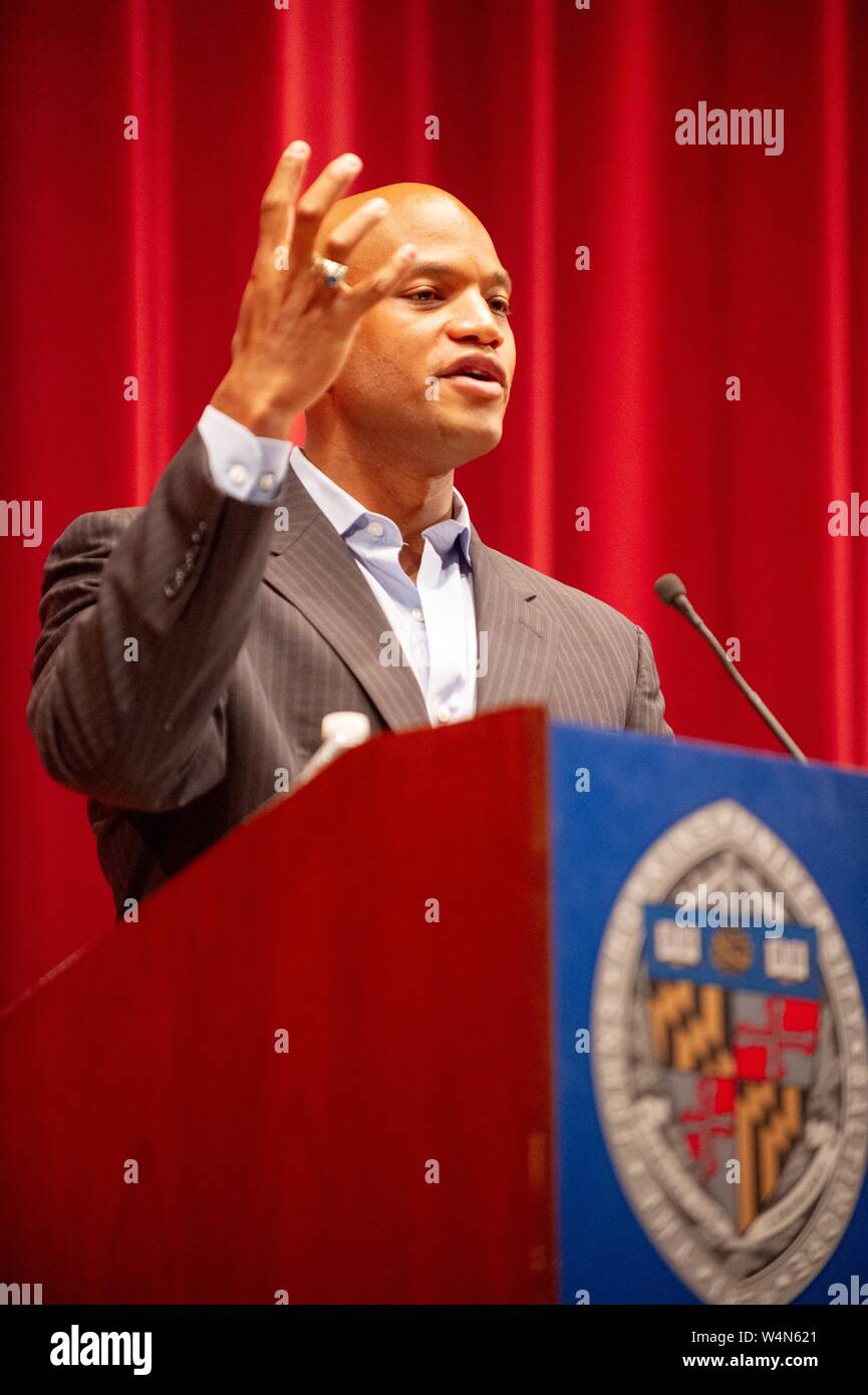 Low-angle view of Wes Moore, author and social entrepreneur, speaking from a podium during a Milton S Eisenhower Symposium at the Johns Hopkins University, Baltimore, Maryland, September 29, 2010. From the Homewood Photography Collection. () Stock Photo