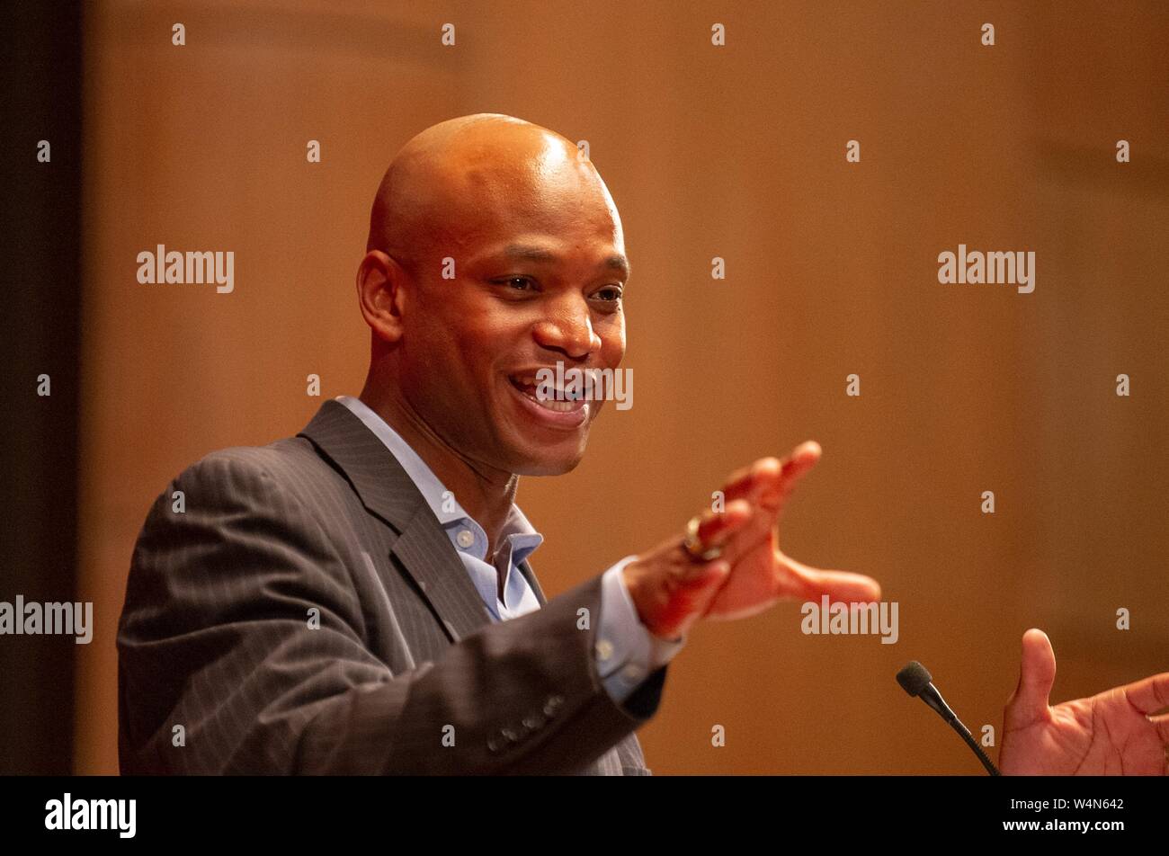 Wes Moore, author and social entrepreneur, smiling while speaking at a Milton S Eisenhower Symposium at the Johns Hopkins University, Baltimore, Maryland, September 29, 2010. From the Homewood Photography Collection. () Stock Photo