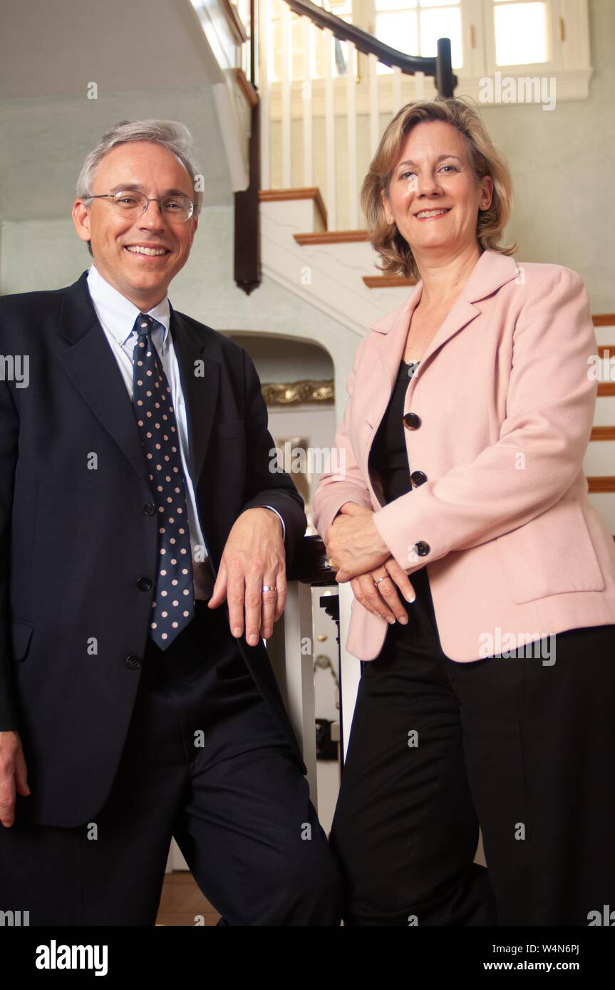 Low Angle shot of Beth Ann Felder, Director of Federal Relations, posing in front of a staircase, with another person, at the Johns Hopkins University, Baltimore, Maryland, April 13, 2006. From the Homewood Photography Collection. () Stock Photo
