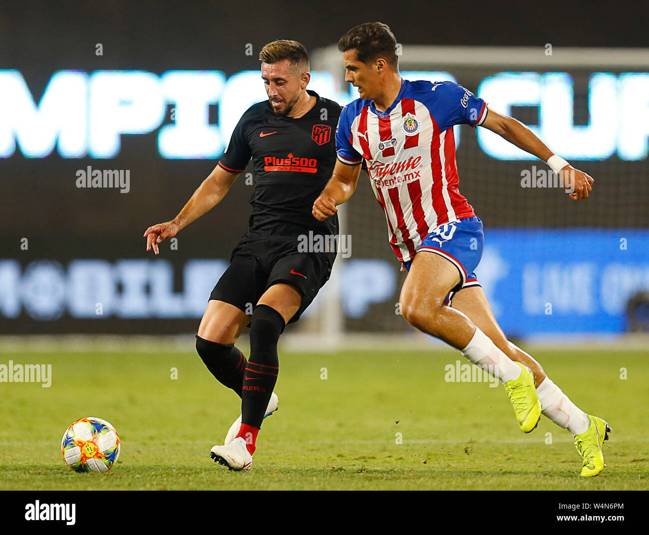 Arlington, Texas, USA. 23rd July, 2019. July 23, 2019, Arlington, Texas, United States; Hector Herrera (16) and Jose de Jesus Gonzalez (30) during the second half of the International Champions Cup match between Chivas de Guadalajara and AtlÅ½tico de Madrid at Globe Life Park in Arlington, Tx. Credit: Ralph Lauer/ZUMA Wire/Alamy Live News Stock Photo