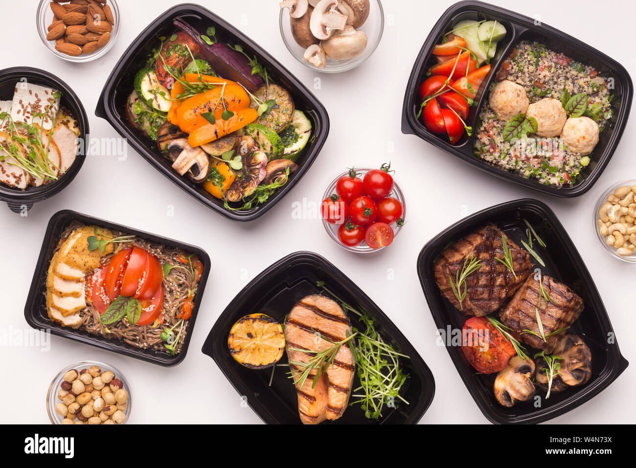 Restaurant healthy food delivery in take away boxes Stock Photo