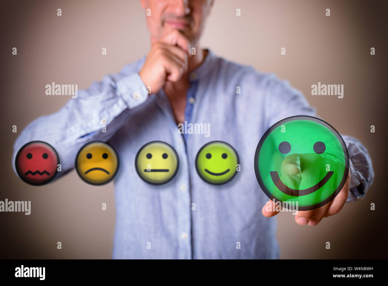 Concept of person deciding positively with colorful emoticon illustrations. Horizontal composition. Front view. Stock Photo