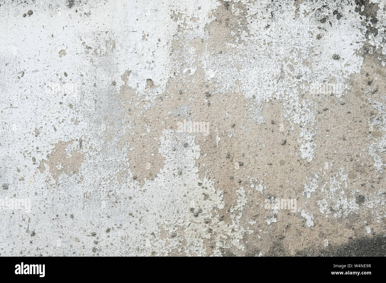 Vintage wall background with peeling paint . Stock Photo