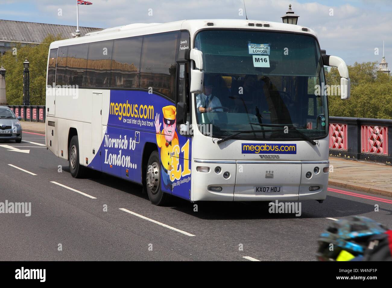 LONDON, UK MAY 13, 2012 People ride Megabus coach in London. Megabus
