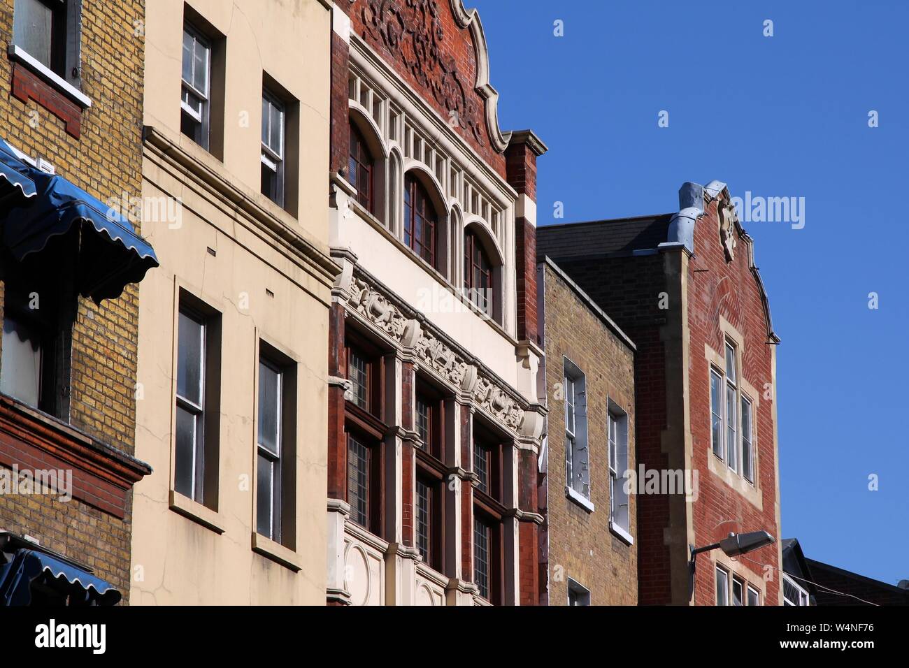 London, United Kingdom - old residential architecture, brick townhouses. Stock Photo