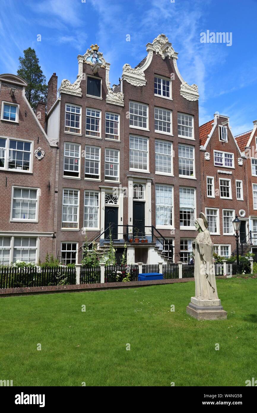 Amsterdam city architecture - Begijnhof residential buildings. Netherlands rowhouse. Stock Photo