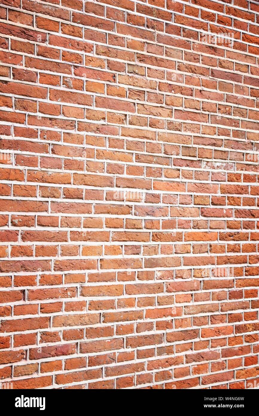 Orange brick wall background. Architectural texture from Amsterdam. Stock Photo