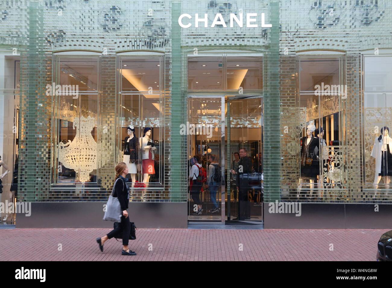 AMSTERDAM, NETHERLANDS - JULY 10, 2017: Person walks by Chanel fashion shop  at . Hooftstraat in Amsterdam. Pieter Cornelis Hooftstraat is the ultim  Stock Photo - Alamy