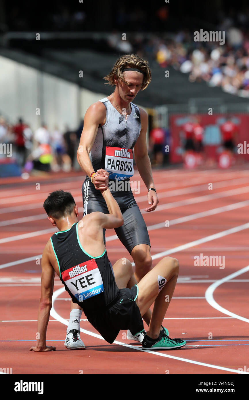 Sam PARSONS (Germany), helping Alexander YEE (Great Britain) to his feet after competing in the Men's 5000m Final at the 2019, IAAF Diamond League, Anniversary Games, Queen Elizabeth Olympic Park, Stratford, London, UK. Stock Photo