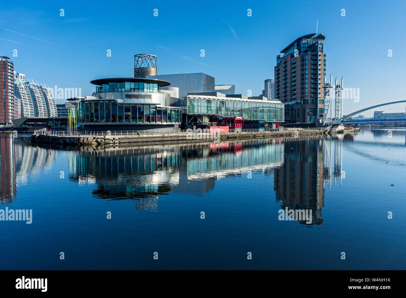 The Lowry Arts Centre and the Imperial Point apartment block, over the Manchester Ship Canal, Salford Quays, Manchester, UK Stock Photo