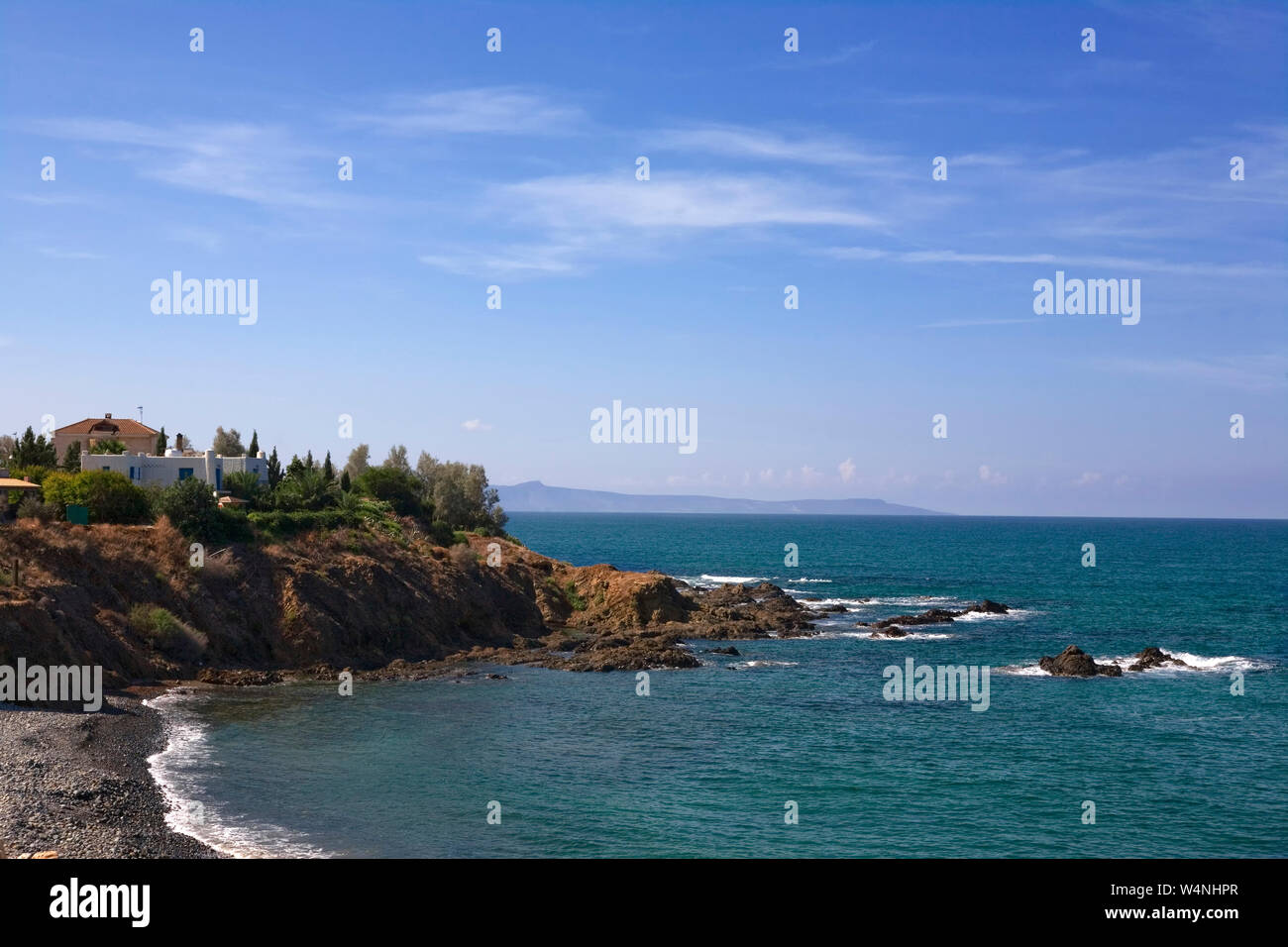 The coast looking west from Pomos, Cyprus, with Akamas Peninsula in the distance Stock Photo