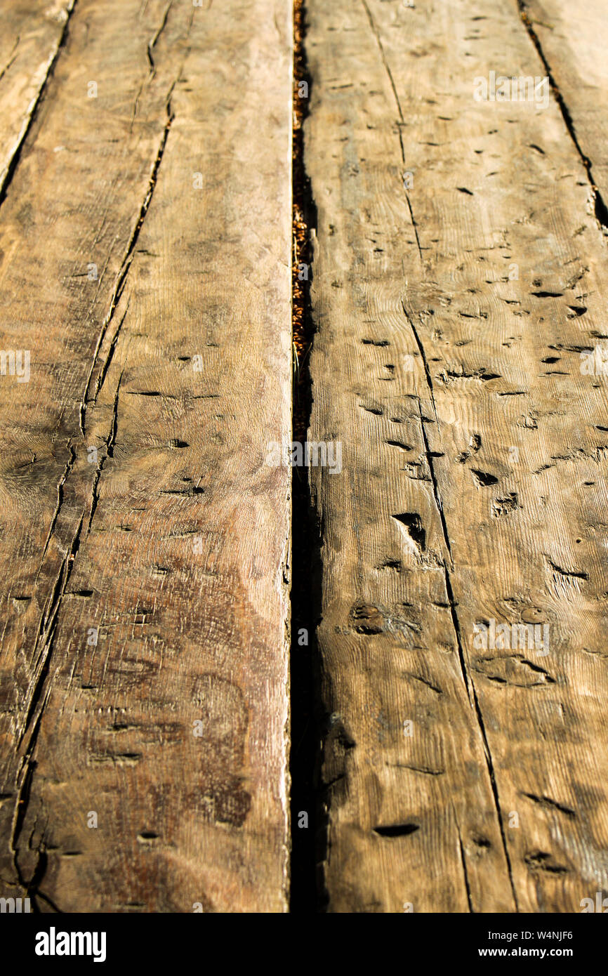 Close up of the old wooden table made from old wooden planks Stock Photo