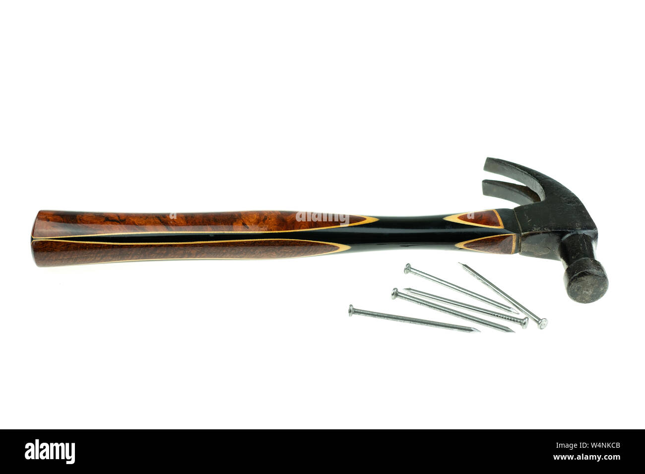 Old traditional curved claw hammer and nail on white background Stock