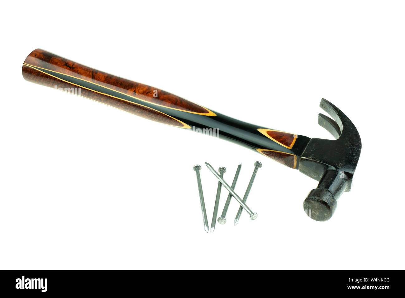 Old traditional curved claw hammer and nail on white background Stock