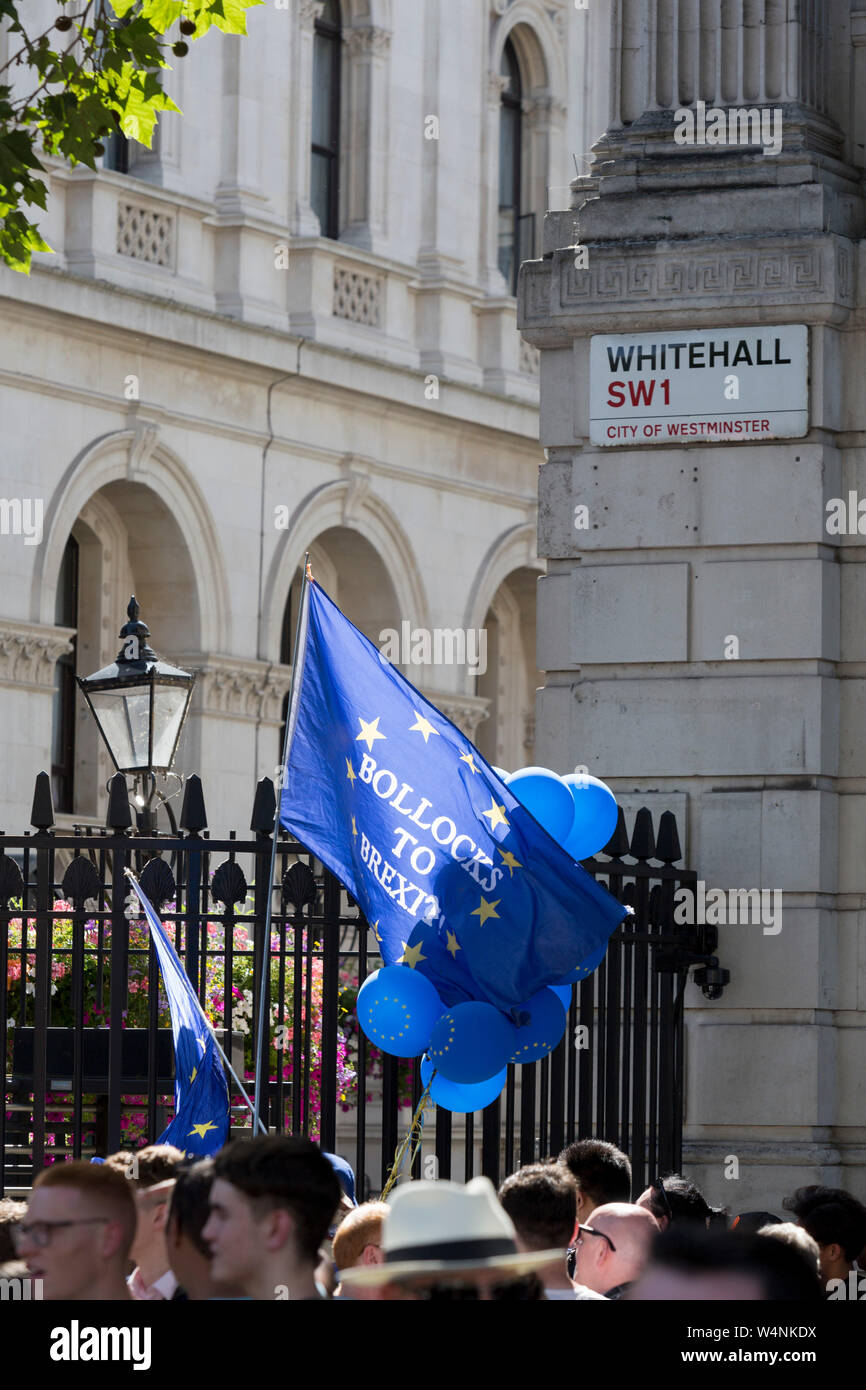 On the day that Britain's new Conservative Party Prime Minister, Boris Johnson enters Downing Street to begin his government administration, replacing Theresa May after her failed Brexit negotiations with the European Union in Brussels, pro-EU remainers protest outside Downing Street, on 24th July 2019, in Westminster, London, England. Stock Photo