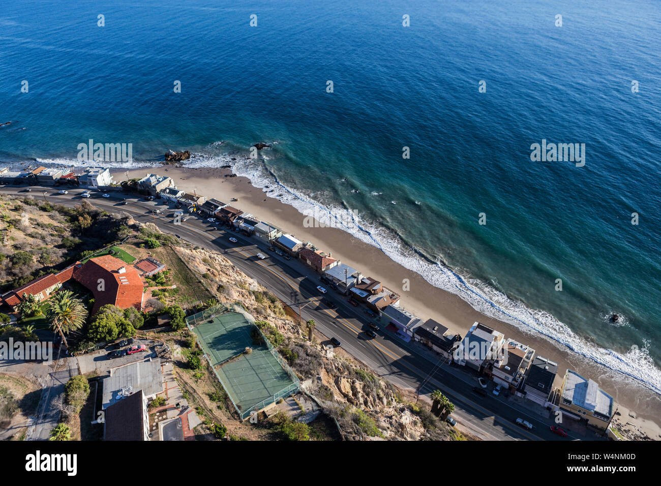 Aerial of beach homes along and above Pacific Coast Highway near Los