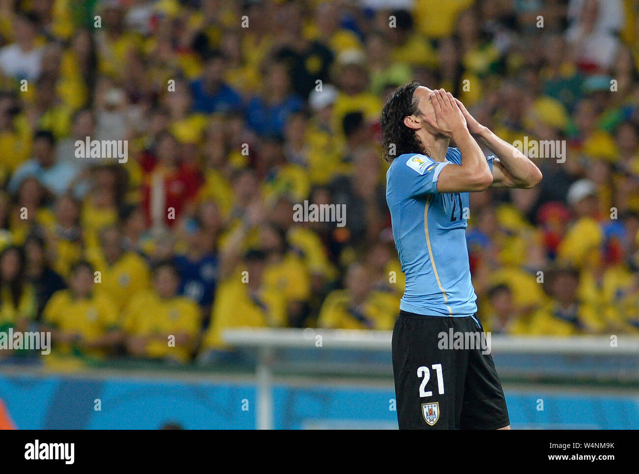 Uruguayan soccer player Cavani kicking a ball during the match Colombia vs Uruguay, for the 2014 World Cup at the Maracanã Stadium in Rio de Janeiro, Stock Photo