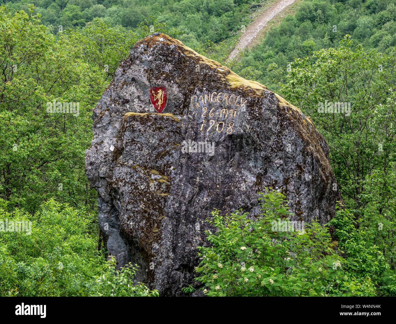 Largest rock of stone slide that dammed up lake Lyngstøylvatnet,  marked as memorial, Norangsdal valley, Norway. Stock Photo