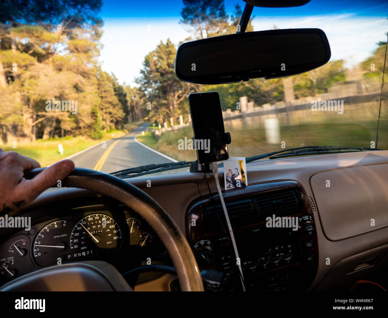Hand on steering wheel hi-res stock photography and images - Alamy