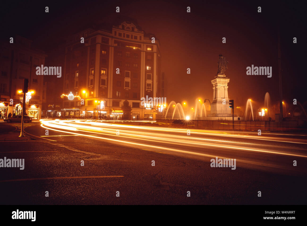 Corners of the city with night fog, light trails Stock Photo