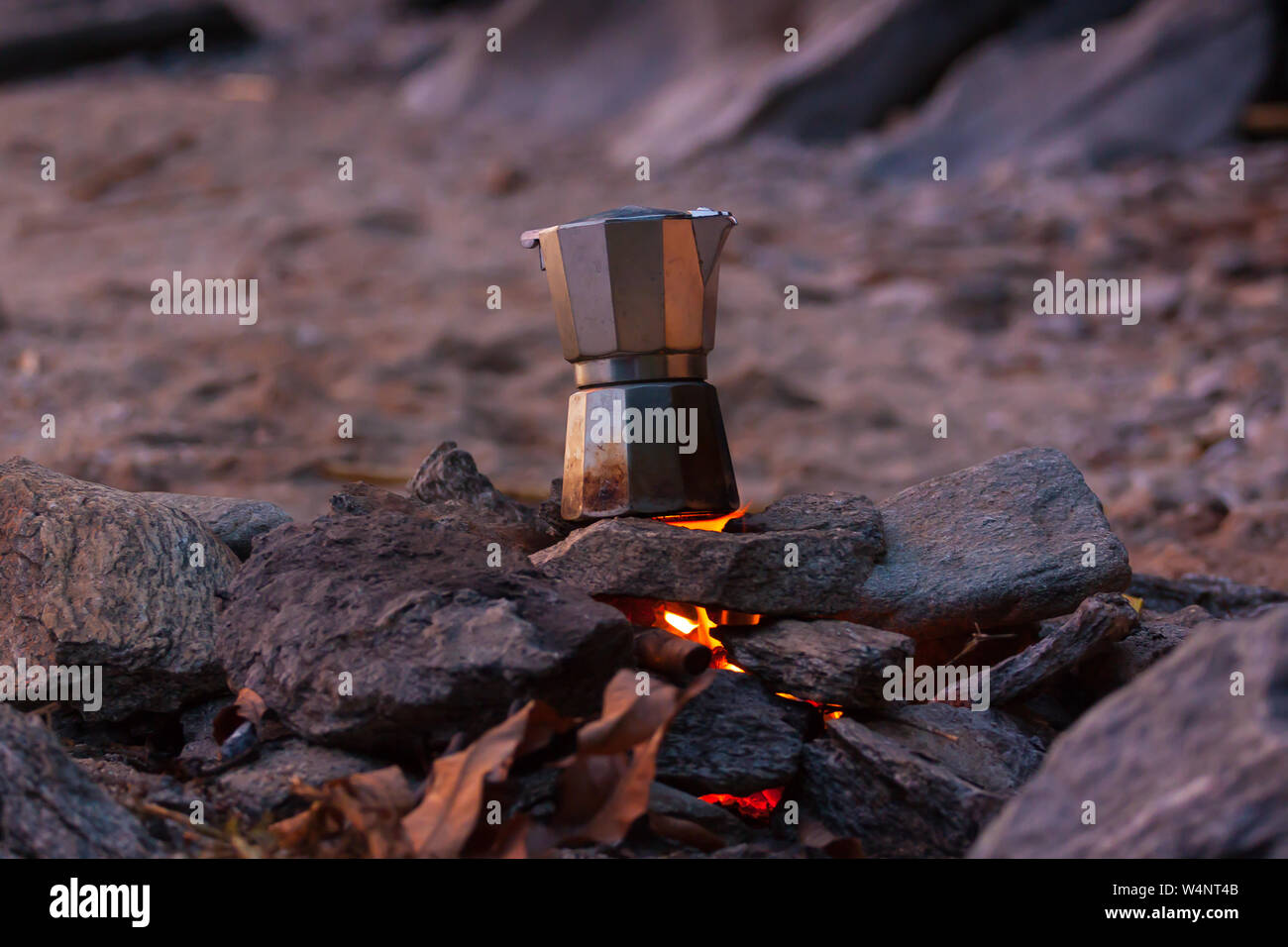 Making a cup of coffee on the beach. Stock Photo